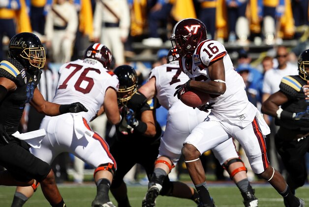 Dec 31, 2013; El Paso, TX, USA; Virginia Tech Hokies wide receiver Carlis Parker (16) runs the ball against the UCLA Bruins defense at Sun Bowl Stadium. Mandatory Credit: Ivan Pierre Aguirre-USA TODAY Sports