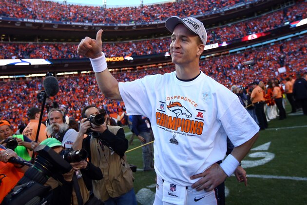 DENVER, CO - JANUARY 19:  Peyton Manning #18 of the Denver Broncos celebrates after they defeated the New England Patriots 26 to 16 during the AFC Championship game at Sports Authority Field at Mile High on January 19, 2014 in Denver, Colorado.  (Photo by Doug Pensinger/Getty Images)