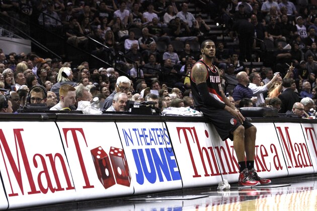 SAN ANTONIO, TX - MAY 6:  LaMarcus Aldridge #12 of the Portland Trail Blazers waits for the play to resume as his team plays the San Antonio Spurs in Game One of the Western Conference Semifinals during the 2014 NBA Playoffs at the AT&T Center on May 6, 2014 in San Antonio, Texas. NOTE TO USER: User expressly acknowledges and agrees that, by downloading and/or using this photograph, user is consenting to the terms and conditions of the Getty Images License Agreement. (Photo by Chris Covatta/Getty Images)