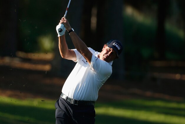 PONTE VEDRA BEACH, FL - MAY 06:  Phil Mickelson of the USA hits a shot during a practice round ahead of THE PLAYERS Championship on The Stadium Course at TPC Sawgrass on May 6, 2014 in Ponte Vedra Beach, Florida.  (Photo by Scott Halleran/Getty Images)