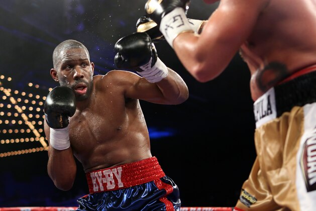 Bryant Jennings, left, in action against Artur Szpilka during their heavyweight fight on Saturday, January 25, 2014 in New York City. Jennings won via 10th round TKO. (AP Photo/Gregory Payan)
