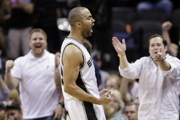 San Antonio Spurs' Tony Parker, of France, celebrates after he was fouled while shooting against the Portland Trail Blazers during the second half of Game 1 of a Western Conference semifinal NBA basketball playoff series, Tuesday, May 6, 2014, in San Antonio. (AP Photo/Eric Gay)