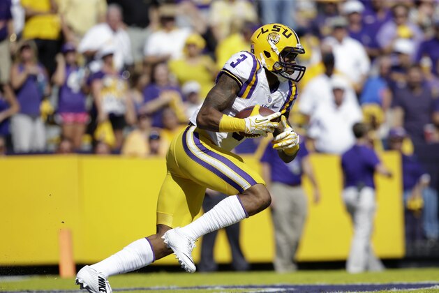 LSU wide receiver Odell Beckham (3) returns a kickoff in the first half of an NCAA college football game against Florida in Baton Rouge, La., Saturday, Oct. 12, 2013. (AP Photo/Gerald Herbert)