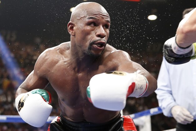 Floyd Mayweather Jr. is seen in his WBC-WBA welterweight title boxing fight against Marcos Maidana Saturday, May 3, 2014, in Las Vegas. (AP Photo/Eric Jamison)