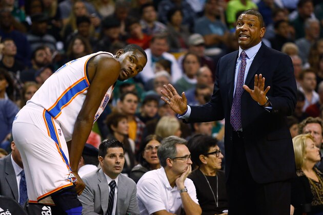 BOSTON, MA - NOVEMBER 23:  Head coach Doc Rivers of the Boston Celtics argues a call with the referees in front of Kevin Durant #35 of the Oklahoma City Thunder during the game on November 23, 2012 at TD Garden in Boston, Massachusetts. NOTE TO USER: User expressly acknowledges and agrees that, by downloading and or using this photograph, User is consenting to the terms and conditions of the Getty Images License Agreement.  (Photo by Jared Wickerham/Getty Images)