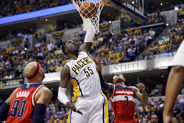 May 7, 2014; Indianapolis, IN, USA; Indiana Pacers center Roy Hibbert (55) dunks against Washington Wizards forward Drew Gooden (90) in game two of the second round of the 2014 NBA Playoffs at Bankers Life Fieldhouse.  Indiana defeats Washington 86-82. Mandatory Credit: Brian Spurlock-USA TODAY Sports