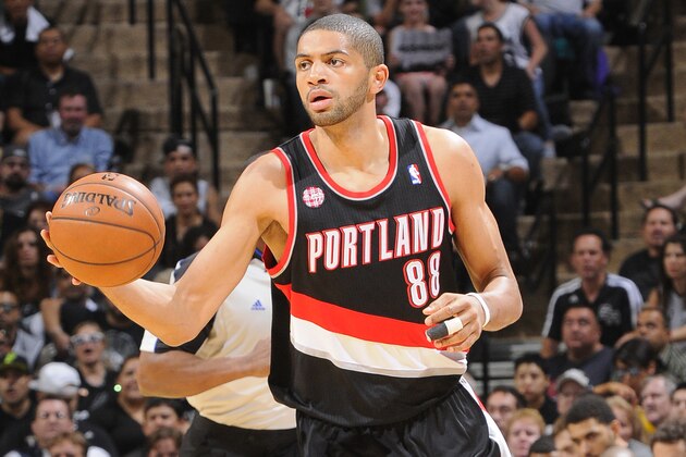 SAN ANTONIO, TX - MAY 6: Nicolas Batum #88 of the Portland Trail Blazers handles the ball against the San Antonio Spurs in Game One of the Western Conference Semi-Finals during the 2014 NBA Playoffs at AT&T Center on May 6, 2014 in San Antonio, Texas. NOTE TO USER: User expressly acknowledges and agrees that, by downloading and/or using this Photograph, user is consenting to the terms and conditions of the Getty Images License Agreement. Mandatory Copyright Notice: Copyright 2014 NBAE (Photo by D. Clarke Evans/NBAE via Getty Images)
