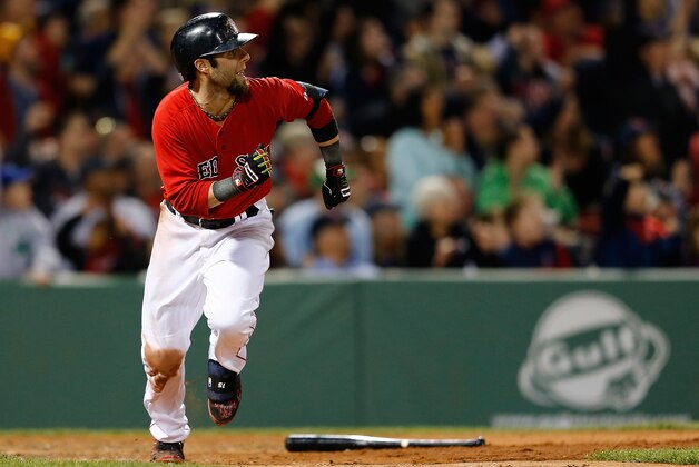 BOSTON, MA - MAY 2: Dustin Pedroia #15 of the Boston Red Sox watches his grand slam home run in the sixth inning against the Oakland Athletics at Fenway Park on May 2, 2014 in Boston, Massachusetts.  (Photo by Jim Rogash/Getty Images)