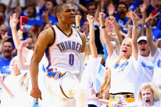 OKLAHOMA CITY, OK - MAY 07:  Russell Westbrook #0 of the Oklahoma City Thunder celebrates a three-point shot against the Los Angeles Clippers in Game Two of the Western Conference Semifinals during the 2014 NBA Playoffs at Chesapeake Energy Arena on May 7, 2014 in Oklahoma City, Oklahoma. NOTE TO USER: User expressly acknowledges and agrees that, by downloading and or using this photograph, User is consenting to the terms and conditions of the Getty Images License Agreement.  (Photo by Ronald Martinez/Getty Images)