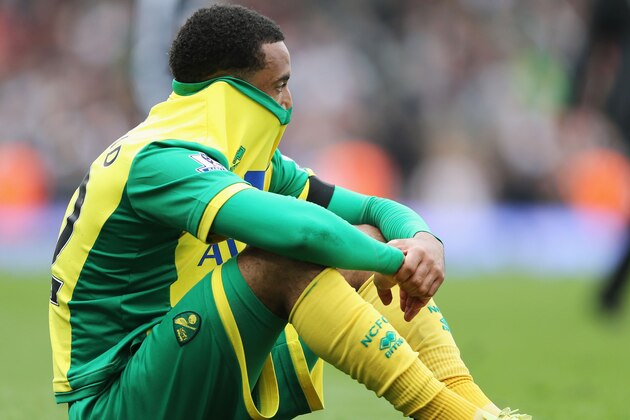 LONDON, ENGLAND - APRIL 12:  Despair for Nathan Redmond of Norwich City after defeat in the Barclays Premier League match between Fulham and Norwich City at Craven Cottage on April 12, 2014 in London, England.  (Photo by Ian Walton/Getty Images)