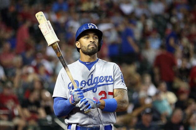 PHOENIX, AZ - APRIL 13:  Matt Kemp #27 of the Los Angeles Dodgers warms up on deck during the MLB game against the Arizona Diamondbacks at Chase Field on April 13, 2014 in Phoenix, Arizona. The Dodgers defeated the Diamondbacks 8-6.  (Photo by Christian Petersen/Getty Images)