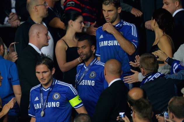 PRAGUE, CZECH REPUBLIC - AUGUST 30:  Fans take pictures of Frank Lampard, Ashley Cole and Branislav Ivanovic of Chelsea after they collected their runners up medal during the UEFA Super Cup between Bayern Muenchen and Chelsea at Stadion Eden on August 30, 2013 in Prague, Czech Republic.  (Photo by Shaun Botterill/Getty Images)