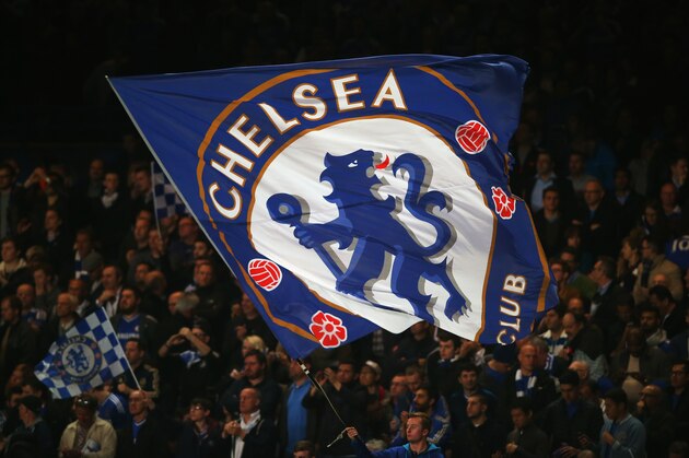 LONDON, ENGLAND - APRIL 30: A Chelsea flag is waved during the UEFA Champions League semi-final second leg match between Chelsea and Club Atletico de Madrid at Stamford Bridge on April 30, 2014 in London, England.  (Photo by Clive Rose/Getty Images)