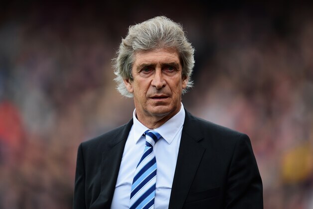 LONDON, ENGLAND - APRIL 27:  Manuel Pellegrini, manager of Manchester City walks out for the Barclays Premier League match between Crystal Palace and Manchester City at Selhurst Park on April 27, 2014 in London, England.  (Photo by Jamie McDonald/Getty Images)