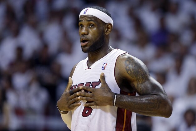 Miami Heat's LeBron James (6) gestures in the second half of Game 1 in an Eastern Conference semifinal basketball game against the Brooklyn Nets, Tuesday, May 6, 2014, in Miami. The Heat defeated the Nets 107-86. (AP Photo/Lynne Sladky)