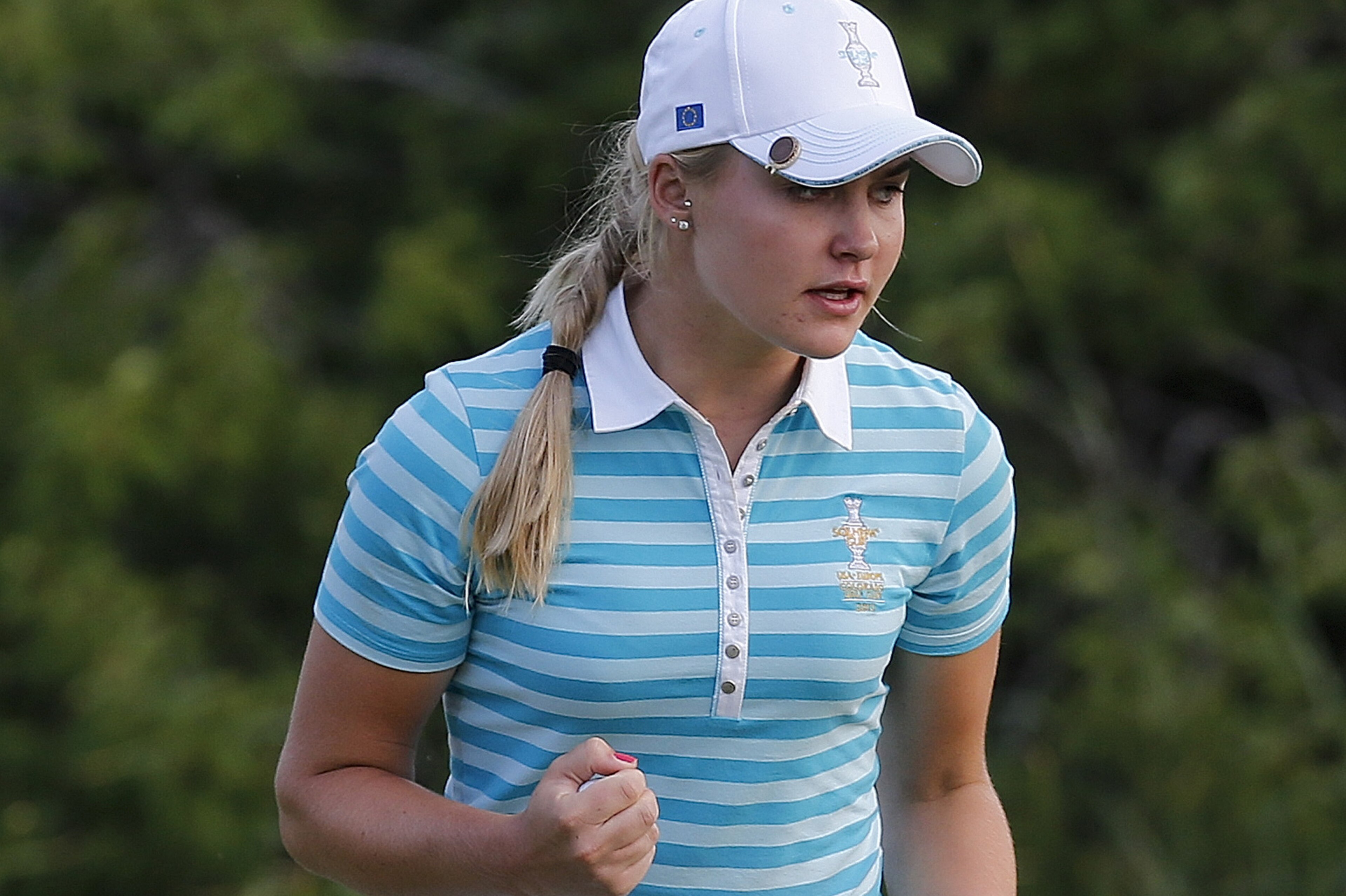 Europe's Charley Hull, from England, reacts after making a birdie putt on the 17th hole during a fourball match against the United States at the Solheim Cup golf tournament on Saturday, Aug. 17, 2013, in Parker, Colo. (AP Photo/Ed Andrieski) Europe's Charley Hull, from England, reacts after making a birdie putt on the 17th hole during a fourball match against the United States at the Solheim Cup golf tournament on Saturday, Aug. 17, 2013, in Parker, Colo. (AP Photo/Ed Andrieski)