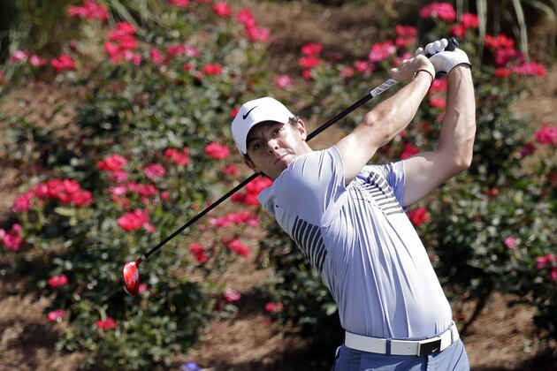 Rory McIlroy, of Northern Ireland, hits a shot from the 18th tee during a practice round for The Players championship golf tournament at TPC Sawgrass in Ponte Vedra Beach, Fla., Wednesday, May 7, 2014. (AP Photo/John Raoux)