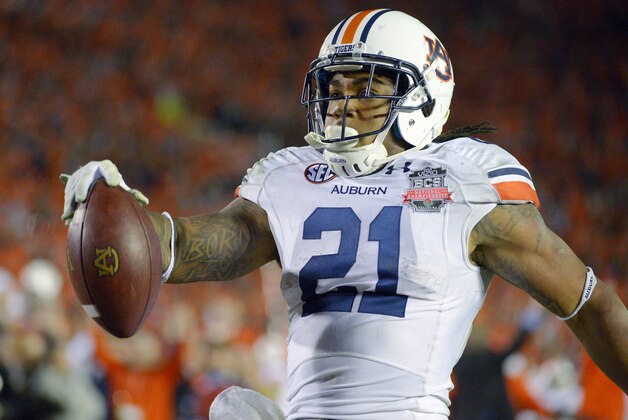 Auburn's Tre Mason heads into the end zone for a touchdown run during the second half of the NCAA BCS National Championship college football game against Florida State Monday, Jan. 6, 2014, in Pasadena, Calif. (AP Photo/Mark J. Terrill)