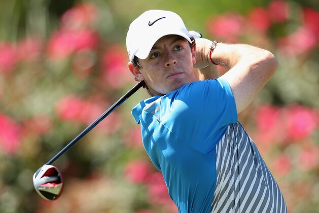 PONTE VEDRA BEACH, FL - MAY 08:  Rory McIlroy of Northern Ireland watches his tee shot on the 18th hole during the first round of THE PLAYERS Championship on The Stadium Course at TPC Sawgrass on May 8, 2014 in Ponte Vedra Beach, Florida.  (Photo by Richard Heathcote/Getty Images)