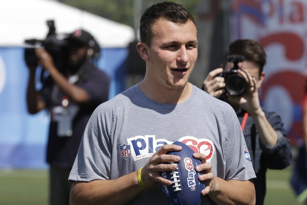 Texas A&M's Johnny Manziel participates in an NFL event in New York, Wednesday, May 7, 2014. The event was to promote Play 60, an NFL program which encourages kids to be active for a healthy life. (AP Photo/Seth Wenig)