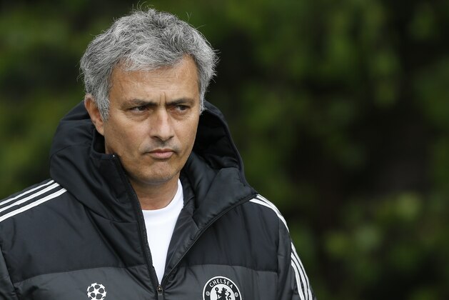 Chelsea manager Jose Mourinho arrives for a training session at Cobham in England, Tuesday, April 29, 2014. Chelsea will play a Champions League semifinal second leg soccer match against Atletico Madrid on Wednesday. (AP Photo/Kirsty Wigglesworth)