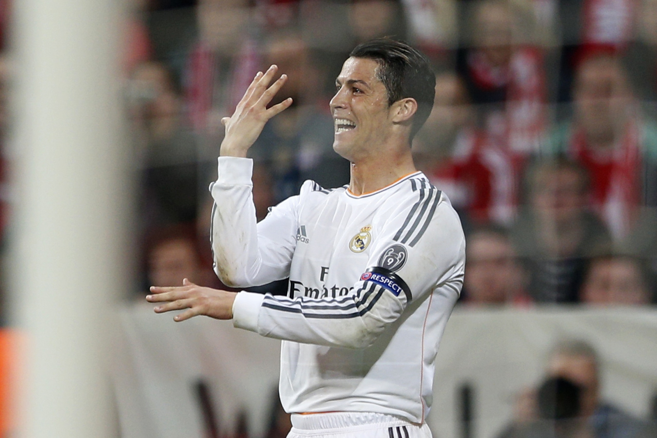 Real's Cristiano Ronaldo celebrates scoring his side's 3rd goal during the Champions League semifinal second leg soccer match between Bayern Munich and Real Madrid at the Allianz Arena in Munich, southern Germany, Tuesday, April 29, 2014. (AP Photo/Matthias Schrader)