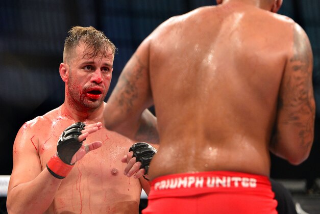Oct 9, 2013; Barueri, Sao Paulo, Brazil; Fabio Maldonado (black shorts) fights against Joey Beltran (red shorts) during UFC Fight Night 29 at Jose Correa Arena. Mandatory Credit: Jason Silva-USA TODAY Sports