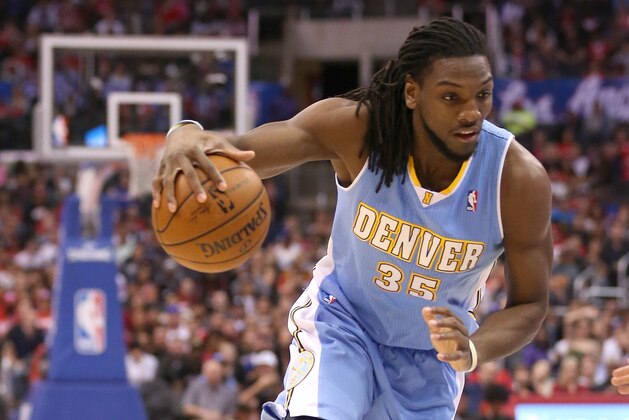 LOS ANGELES, CA - APRIL 15:  Kenneth Faried #35 of the Denver Nuggets drives against the Los Angeles Clippers at Staples Center on April 15, 2014 in Los Angeles, California.  NOTE TO USER: User expressly acknowledges and agrees that, by downloading and or using this photograph, User is consenting to the terms and conditions of the Getty Images License Agreement.  (Photo by Stephen Dunn/Getty Images)