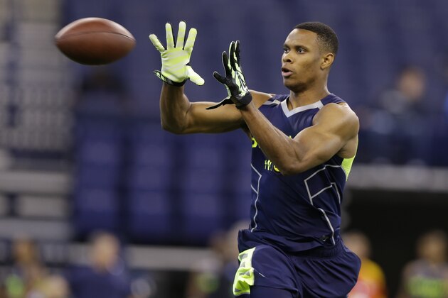 Vanderbilt wide receiver Jordan Matthews makes a catch during a drill at the NFL football scouting combine in Indianapolis, Sunday, Feb. 23, 2014. (AP Photo/Michael Conroy)