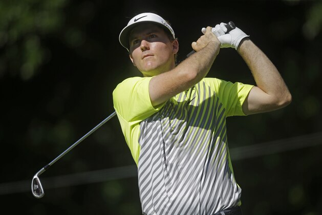 Russell Henley hits from the eighth tee during the first round of The Players championship golf tournament at TPC Sawgrass, Thursday, May 8, 2014 in Ponte Vedra Beach, Fla. (AP Photo/Gerald Herbert)