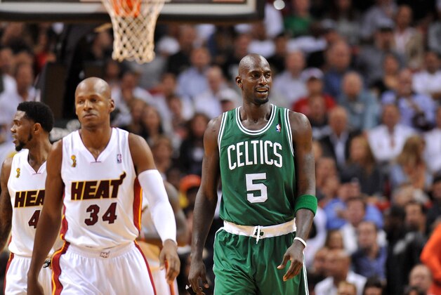Oct 30, 2012; Miami, FL, USA; Boston Celtics power forward Kevin Garnett (right) and Miami Heat shooting guard Ray Allen (left) during the second half at American Airlines Arena. Mandatory Credit: Steve Mitchell-USA TODAY Sports