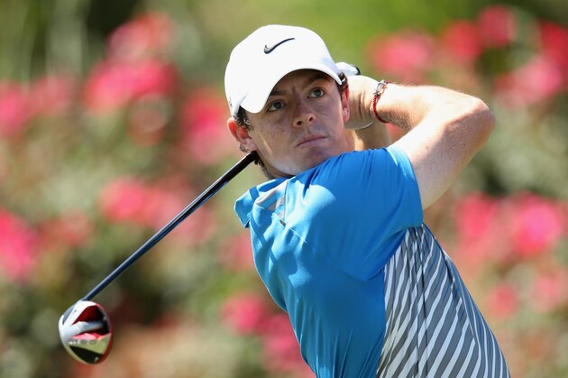 PONTE VEDRA BEACH, FL - MAY 08:  Rory McIlroy of Northern Ireland watches his tee shot on the 18th hole during the first round of THE PLAYERS Championship on The Stadium Course at TPC Sawgrass on May 8, 2014 in Ponte Vedra Beach, Florida.  (Photo by Richard Heathcote/Getty Images)