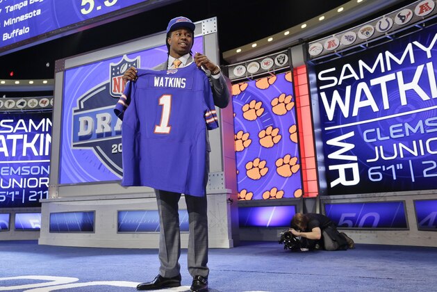 Clemson wide receiver Sammy Watkins poses for photos after being selected by the Buffalo Bills as the fourth round pick in the first round of the 2014 NFL Draft, Thursday, May 8, 2014, in New York. (AP Photo/Craig Ruttle)