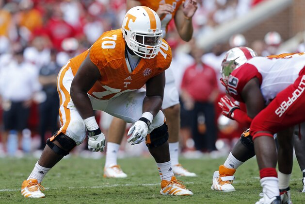 Tennessee offensive lineman Ja'Wuan James (70) readies to block during an NCAA college football game against Western Kentucky  on Saturday, Sept. 7, 2013 in Knoxville, Tenn. (AP Photo/Wade Payne)