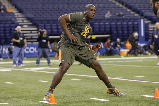 Tennessee offensive lineman Ja'Wuan James runs a drill at the NFL football scouting combine in Indianapolis, Saturday, Feb. 22, 2014. (AP Photo/Michael Conroy)