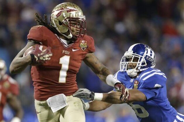 FILE - In this Dec. 7 2013, file photo, Florida State's Kelvin Benjamin (1) runs past Duke's Ross Cockrell (6) for a touchdown in the second half of the Atlantic Coast Conference Championship NCAA football game in Charlotte, N.C. Benjamin was selected in the first round, 28th overall, by the Carolina Panthers in the NFL draft on Thursday, May 8, 2014. (AP Photo/Bob Leverone, File)