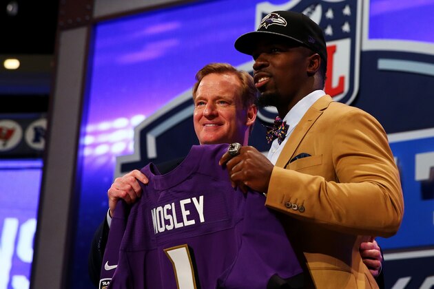 NEW YORK, NY - MAY 08:  C.J. Mosley of the Alabama Crimson Tide poses with NFL Commissioner Roger Goodell after he was picked #17 overall by the Baltimore Ravens during the first round of the 2014 NFL Draft at Radio City Music Hall on May 8, 2014 in New York City.  (Photo by Elsa/Getty Images)