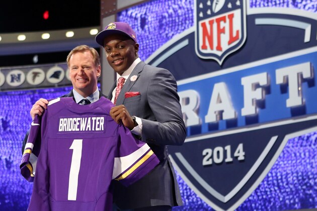 May 8, 2014; New York, NY, USA; Teddy Bridgewater (Louisville) poses with NFL commissioner Roger Goodell after being selected as the number thirty-two overall pick in the first round of the 2014 NFL Draft to the Minnesota Vikings at Radio City Music Hall. Mandatory Credit: Adam Hunger-USA TODAY Sports