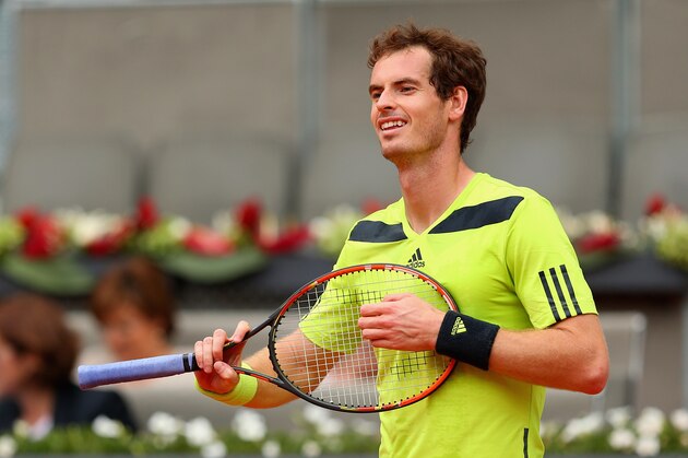 MADRID, SPAIN - MAY 08:  Andy Murray of Great Britain shows his frustrations against Santiago Giraldo of Columbia in their third round match during day six of the Mutua Madrid Open tennis tournament at the Caja Magica on May 8, 2014 in Madrid, Spain.  (Photo by Clive Brunskill/Getty Images)