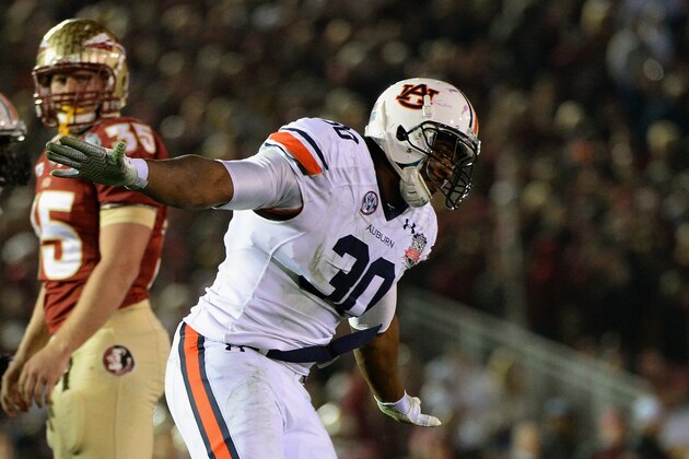 PASADENA, CA - JANUARY 06:  Defensive end Dee Ford #30 of the Auburn Tigers reacts to a play against the Florida State Seminoles during the 2014 Vizio BCS National Championship Game at the Rose Bowl on January 6, 2014 in Pasadena, California.  (Photo by Harry How/Getty Images)
