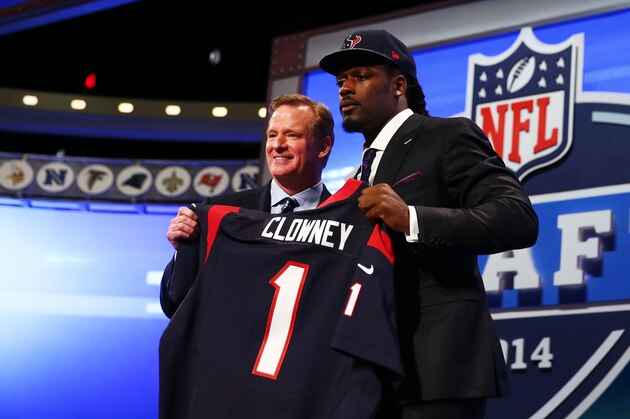 NEW YORK, NY - MAY 08:  Jadeveon Clowney of the South Carolina Gamecocks stands on stage with NFL Commissioner Roger Goodell after he was picked #1 overall by the Houston Texansduring the first round of the 2014 NFL Draft at Radio City Music Hall on May 8, 2014 in New York City.  (Photo by Elsa/Getty Images)