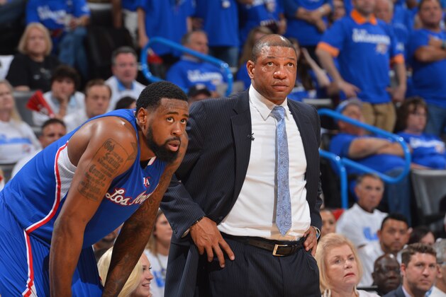 OKLAHOMA CITY, OK - MAY 7: DeAndre Jordan #6 and head coach Doc Rivers of the Los Angeles Clippers during a game against the Oklahoma City Thunder in Game Two of the Western Conference Semifinals during the 2014 NBA Playoffs on May 7, 2014 at the Chesapeake Energy Arena in Oklahoma City, Oklahoma. NOTE TO USER: User expressly acknowledges and agrees that, by downloading and or using this Photograph, user is consenting to the terms and conditions of the Getty Images License Agreement. Mandatory Copyright Notice: Copyright 2014 NBAE (Photo by Jesse D. Garrabrant/NBAE via Getty Images)