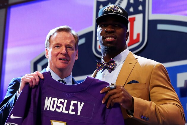 NEW YORK, NY - MAY 08:  C.J. Mosley of the Alabama Crimson Tide poses with NFL Commissioner Roger Goodell after he was picked #17 overall by the Baltimore Ravens during the first round of the 2014 NFL Draft at Radio City Music Hall on May 8, 2014 in New York City.  (Photo by Elsa/Getty Images)