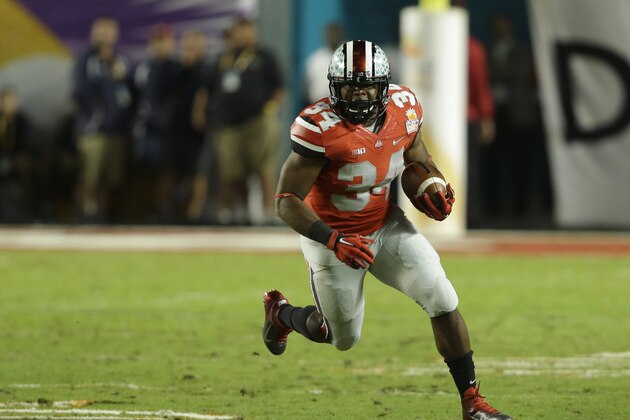 Ohio State running back Carlos Hyde (34) runs during the first half of the Orange Bowl NCAA college football game against Clemson, Friday, Jan. 3, 2014, in Miami Gardens, Fla. (AP Photo/Wilfredo Lee)