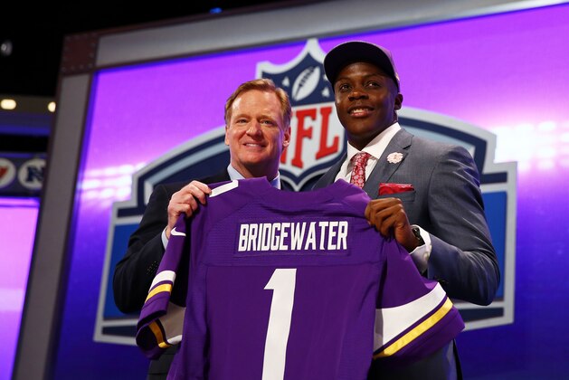 NEW YORK, NY - MAY 08:  Teddy Bridgewater of the Louisville Cardinals poses with NFL Commissioner Roger Goodell after he was picked #32 overall by the Minnesota Vikings during the first round of the 2014 NFL Draft at Radio City Music Hall on May 8, 2014 in New York City.  (Photo by Elsa/Getty Images)