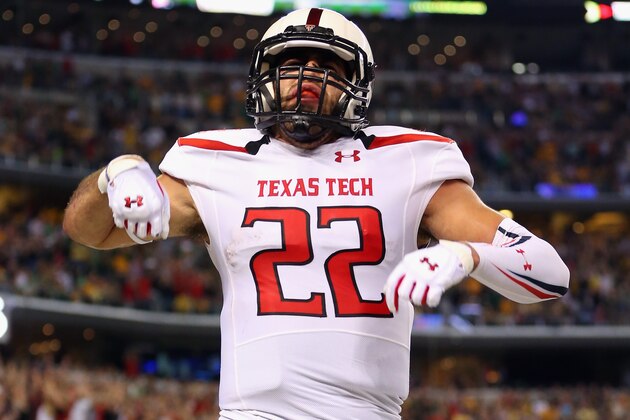 ARLINGTON, TX - NOVEMBER 16:  Jace Amaro #22 of the Texas Tech Red Raiders celebrates a touchdown against the Baylor Bears at AT&T Stadium on November 16, 2013 in Arlington, Texas.  (Photo by Ronald Martinez/Getty Images)