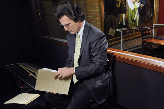 In this Tuesday, April 7, 2009 photo, football draft analyst Mel Kiper Jr prepares for a taping at the ESPN Zone in Baltimore. Saturday marks the 25th anniversary of Kiper's 1984 debut on ESPN's draft coverage, and while his demeanor and hair haven't changed all that much, his popularity certainly has. (AP Photo/Gail Burton)