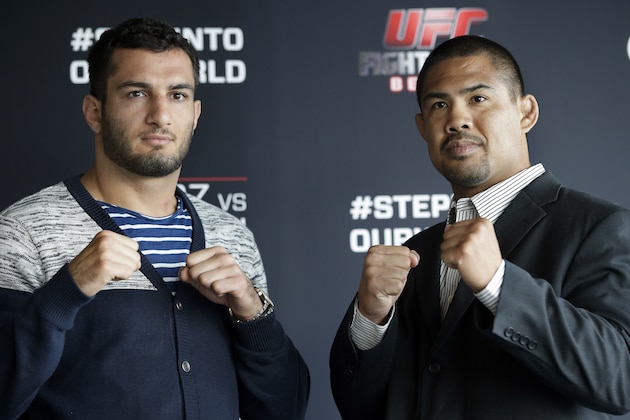 Dutch middleweight fighter Gegard Mousasi, left, and Mark Munoz from the US, right, pose for the photographers prior to a joint press conference in Berlin, Germany, Thursday, April 3, 2014. Munoz and Mousasi will fight during a UFC (Ultimate Fighting Championship) fight night in Berlin on Saturday, May 31, 2014. (AP Photo/Michael Sohn) Dutch middleweight fighter Gegard Mousasi, left, and Mark Munoz from the US, right, pose for the photographers prior to a joint press conference in Berlin, Germany, Thursday, April 3, 2014. Munoz and Mousasi will fight during a UFC (Ultimate Fighting Championship) fight night in Berlin on Saturday, May 31, 2014. (AP Photo/Michael Sohn)