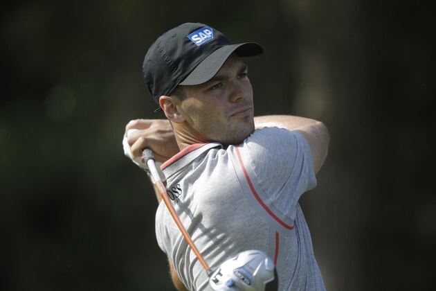 Martin Kaymer of Germany watches his shot from the seventh tee during the second round of The Players championship golf tournament at TPC Sawgrass, Friday, May 9, 2014 in Ponte Vedra Beach, Fla. (AP Photo/Gerald Herbert)