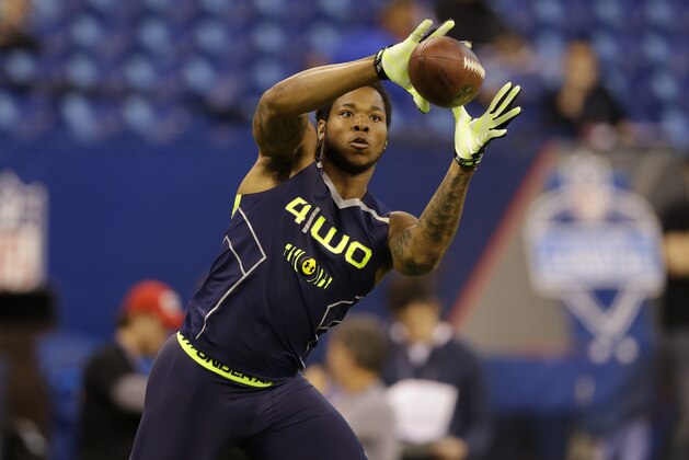Florida State wide receiver Kelvin Benjamin makes a catch during a drill at the NFL football scouting combine in Indianapolis, Sunday, Feb. 23, 2014. (AP Photo/Michael Conroy)